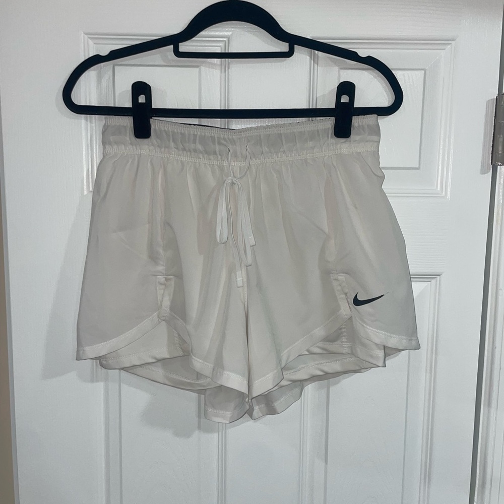 Nike Women's White Athletic Shorts with Black Logo